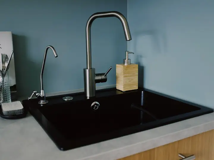 Modern kitchen sink with a chrome faucet