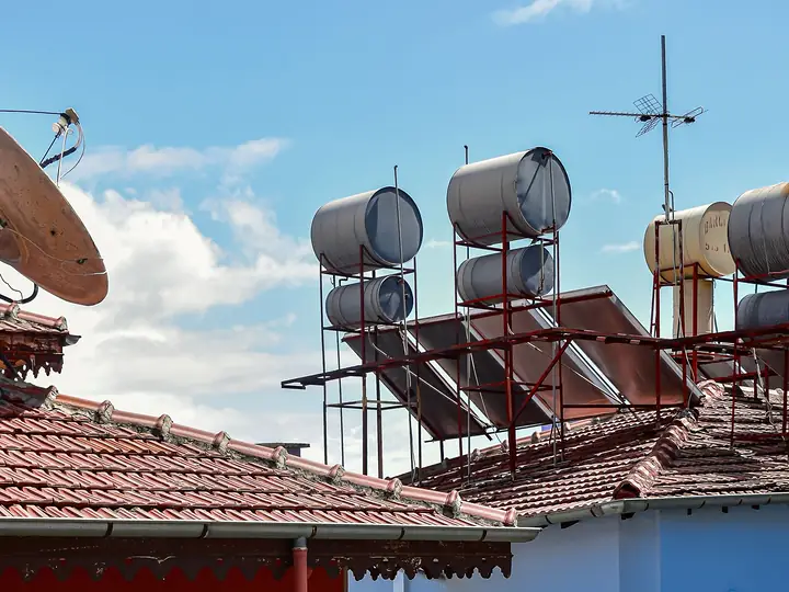 Solar water heaters on house rooftops